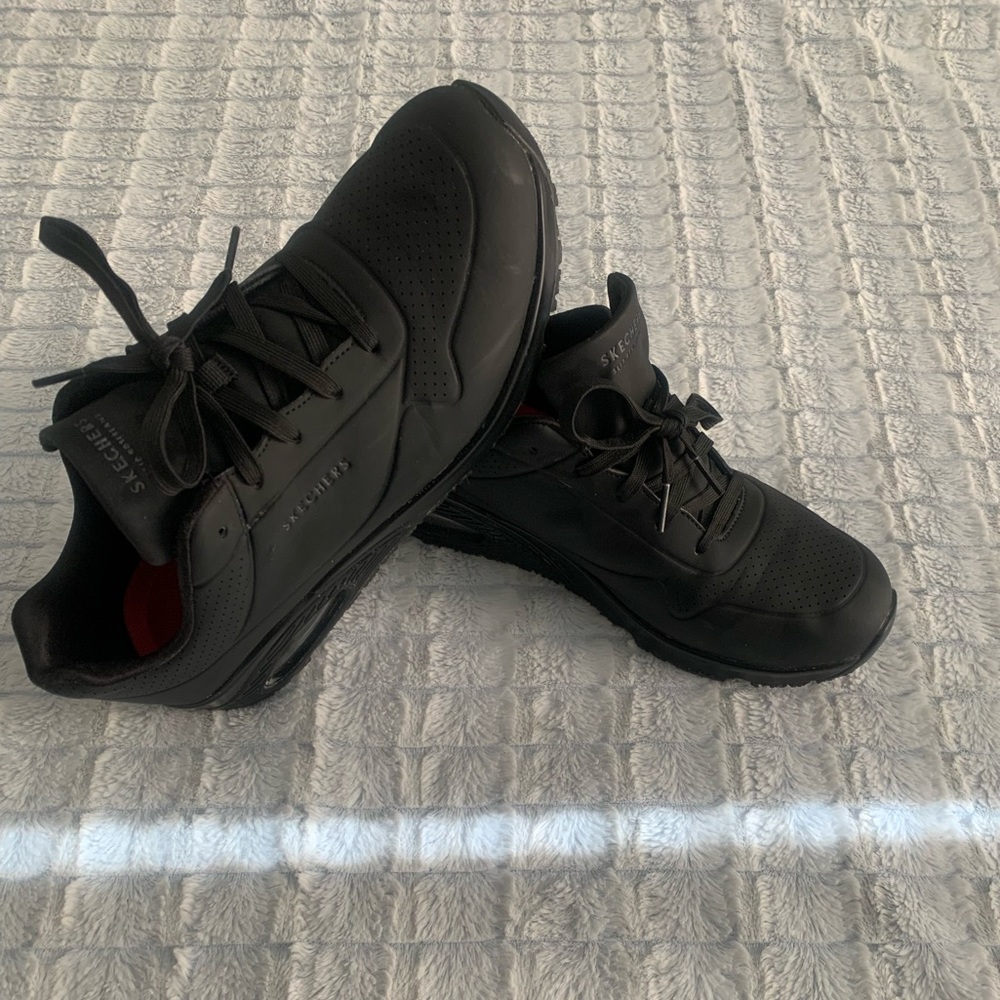 Black Skechers slip resistant work shoes, size 11